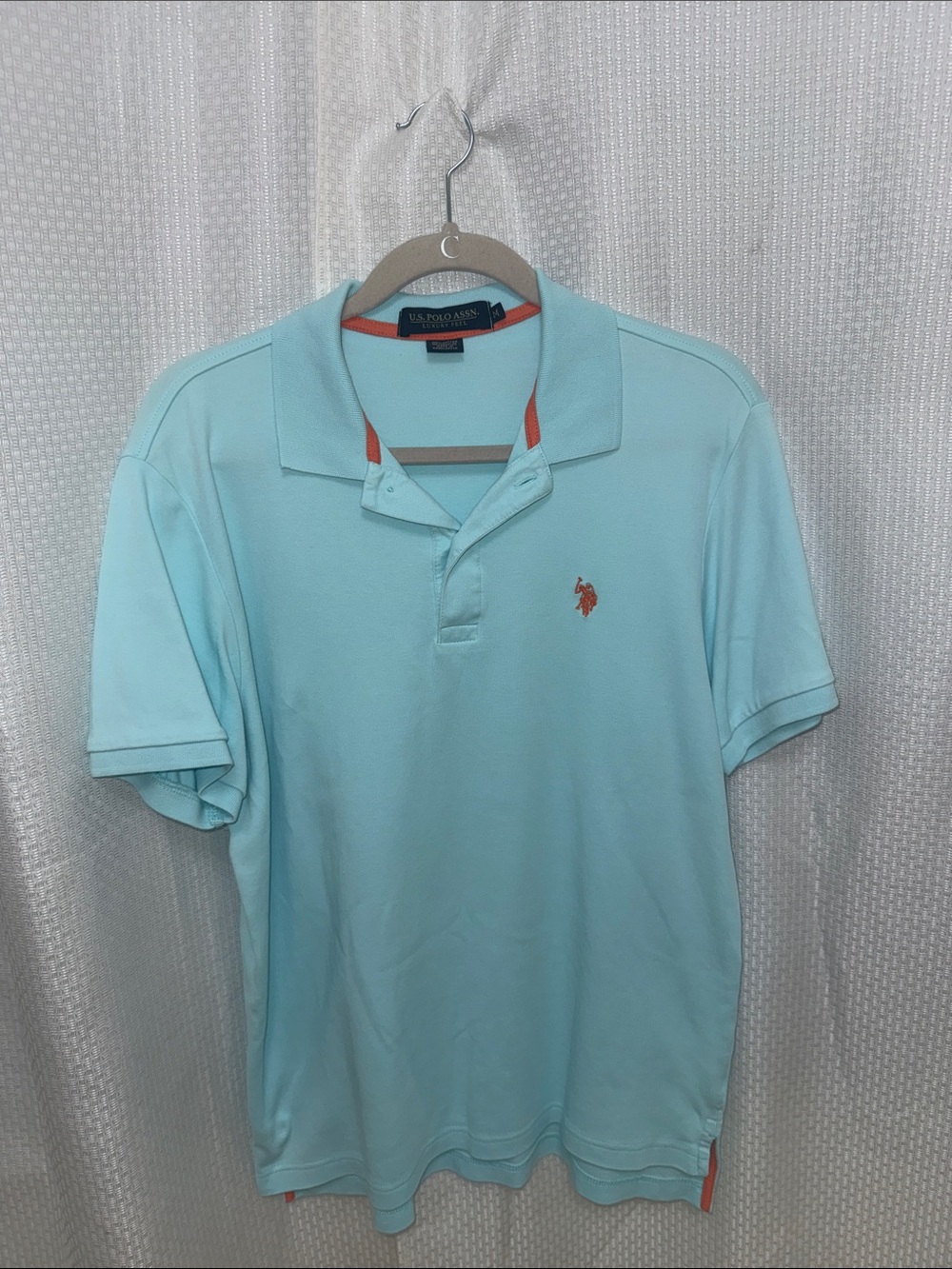 U.S. Polo Assn. Men's Pale Blue Polo with Orange Logo Accents